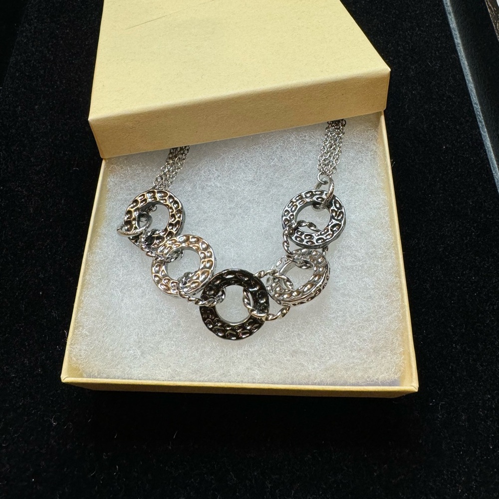 Lia Sophia “United” necklace, silver and hematite finish, 16”-19”. Like New.